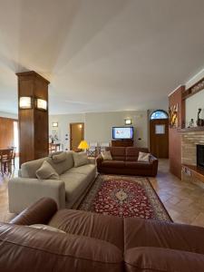 TV a/nebo společenská místnost v ubytování Cerqua Rosara Residence