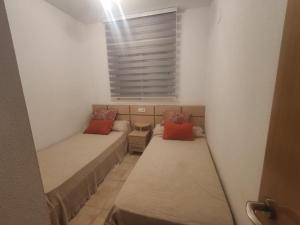 Postel nebo postele na pokoji v ubytování Jardines del mar