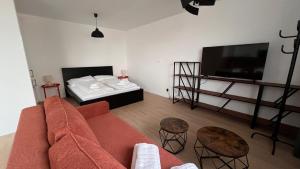 Posteľ alebo postele v izbe v ubytovaní 1,5 room Apartment with terrace, new building, B1