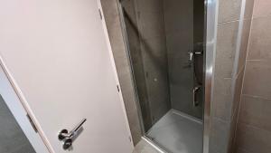 Kúpeľňa v ubytovaní 1,5 room Apartment with terrace, new building, B1