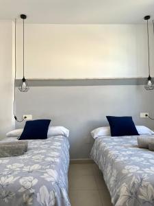 Postel nebo postele na pokoji v ubytování Apartamento San Juan 3