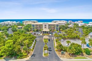 an aerial view of a resort with the ocean in the background at Hp 422 Blue Haven in Rosemary Beach