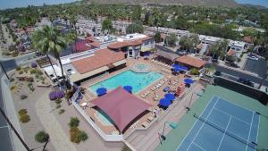 an overhead view of a swimming pool at a resort at Perfect Friends Escape in Old Town Scottsdale with Resort Pool Access and Roof Deck! in Scottsdale