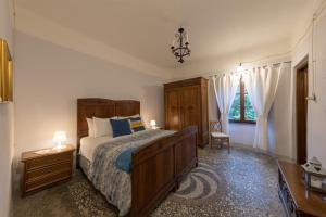 Posteľ alebo postele v izbe v ubytovaní Un'Ottima Annata B&B