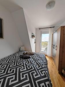 Posteľ alebo postele v izbe v ubytovaní Apartman Monika 2