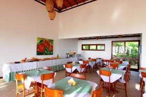 Restoranas ar kita vieta pavalgyti apgyvendinimo įstaigoje Enseada dos Corais Praia Hotel