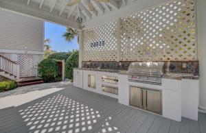an outdoor kitchen in a home with at Endless Summer by AvantStay Across From Beach Ocean Views in Isle of Palms