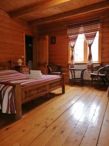Postel nebo postele na pokoji v ubytování Stara Khata Карпати