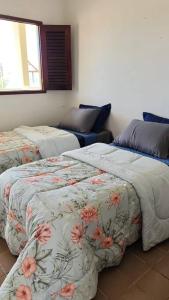 Casa de Praia房間的床