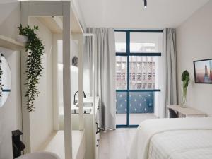 Postel nebo postele na pokoji v ubytování Apê Metrô Paraíso + 75 fotografií