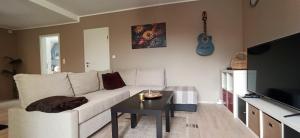 Телевизор и/или развлекательный центр в Sonnenplatz an der Weser I Nähe HDZ I Bali Therme I Kurpark I GOP