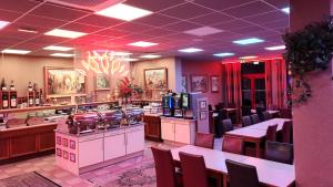 Lounge nebo bar v ubytování Hôtel Siatel Besançon Chateaufarine