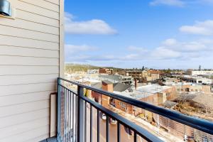a balcony with a view of the city at Putnam Pointe Perch #510 in Bend