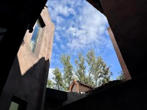 a view from a building looking up at the sky at Val'Quirico Lucca 84 Loft Toscano in Santeagueda