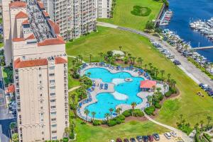 an aerial view of the pool at the resort at Family friendly spacious Barefoot townhome in North Myrtle Beach