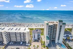 an aerial view of the beach and the ocean at Family friendly spacious Barefoot townhome in North Myrtle Beach
