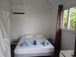 Postel nebo postele na pokoji v ubytování B. O. PARADIS SXM
