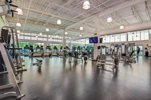 a gym with a lot of treadmills and machines at Sea Colony --- 105 Island House Rd in Bethany Beach