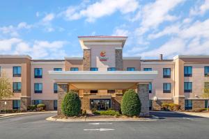 a rendering of a hotel front of a building at Comfort Suites Whitsett in Whitsett