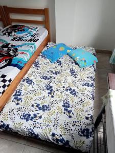 Cama ou camas em um quarto em Hostal Turístico Ninfa del Mar