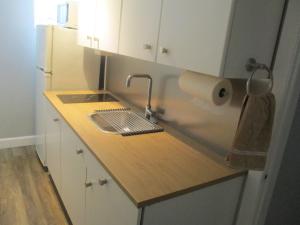 A kitchen or kitchenette at High Park Single room with exclusive washroom and kitchen for solo travelers