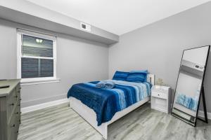Letto o letti in una camera di Spacious 1 bed with Arcade game 13 minutes from EWR
