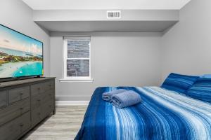 Letto o letti in una camera di Spacious 1 bed with Arcade game 13 minutes from EWR