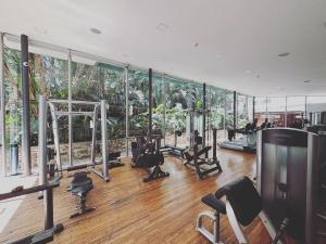 a gym with a large wall of glass at Departamento en Puerto Madero in Buenos Aires