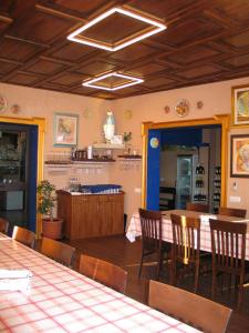 A restaurant or other place to eat at Hotel Bed & Breakfast Minu'