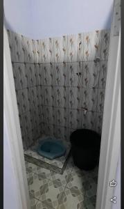 Ein Badezimmer in der Unterkunft Homestay Tuk Dalang Renggo