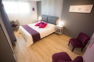 Postel nebo postele na pokoji v ubytování Chambre d'hôtes Les Bruyères
