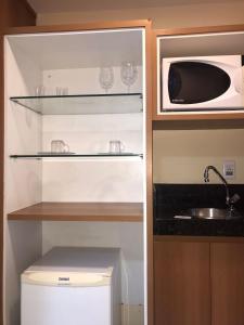 Køkken eller tekøkken på Flat Ponta Negra vista para o mar