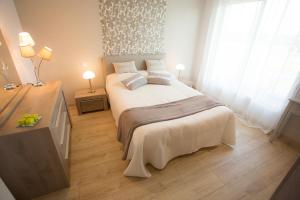 Postel nebo postele na pokoji v ubytování Chambre d'hôtes Les Bruyères