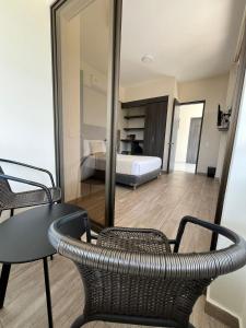 Postel nebo postele na pokoji v ubytování Hotel Le Falep & Spa