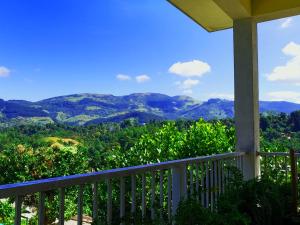 a balcony with a view of the mountains at Pretty Villa in Gelioya
