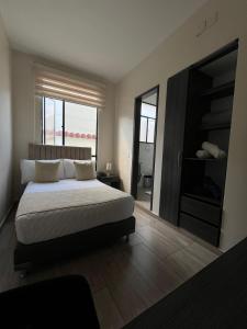 Postel nebo postele na pokoji v ubytování Hotel Le Falep & Spa
