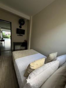 Postel nebo postele na pokoji v ubytování Hotel Le Falep & Spa
