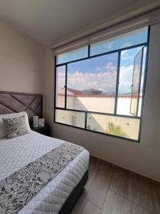 Postel nebo postele na pokoji v ubytování Hotel Le Falep & Spa