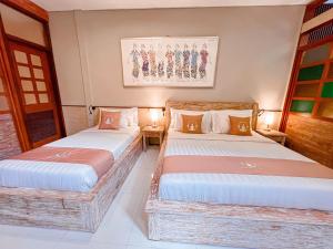Postel nebo postele na pokoji v ubytování Alam Kawi Ubud Resort & Spa