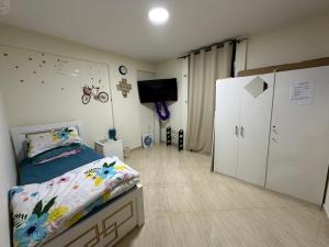 Fotografija v galeriji nastanitve Private Room Shared Apartment Flat31-R1 v mestu Abu Dhabi
