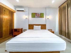Lara Homestay客房内的一张或多张床位