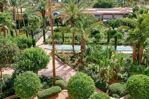 an overhead view of a garden with trees and bushes at Le Meridien N'fis in Marrakech