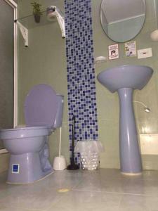 Ένα μπάνιο στο Casa Turistica Dónde MATHY'S #1 Barrio Sarie Bay +76 φωτογραφίες