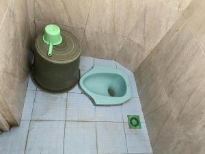 Koupelna v ubytování SPOT ON 93754 Buduran Homestay Syariah