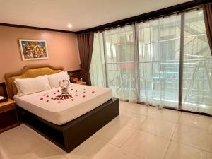 Postel nebo postele na pokoji v ubytování Red Coco Inn de Boracay