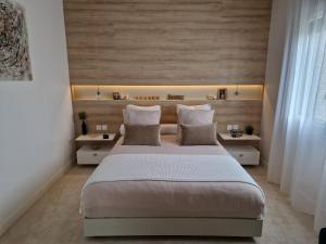 Säng eller sängar i ett rum på Belle maison moderne idéale JO proche aeroport CDG et parc Asterix