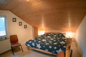 Postel nebo postele na pokoji v ubytování Breege - Ferienwohnung Kipp 1