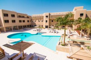 an image of a swimming pool at a resort at The Breakers Diving and Surfing Lodge Soma Bay in Hurghada