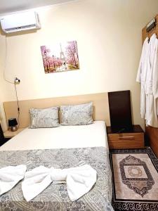 Rose & Water Guest house tesisinde bir odada yatak veya yataklar