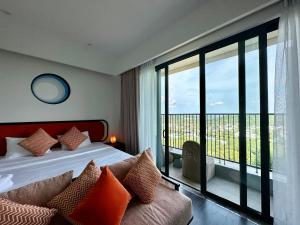Giường trong phòng chung tại Hillside condo at Sunset town - Southern Phu Quoc
